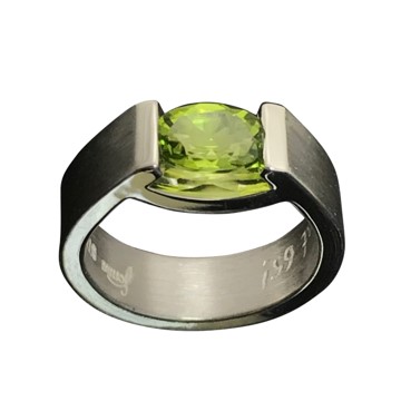 peridot smile ring in sterling silver oval cut gemstone in green