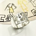 Portrait of mom design on family ring by her child