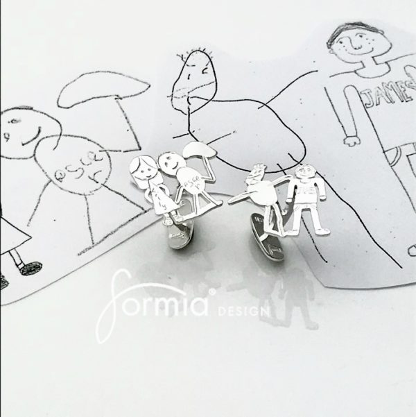 two kids portrait drawings on cufflinks for daddys birthday