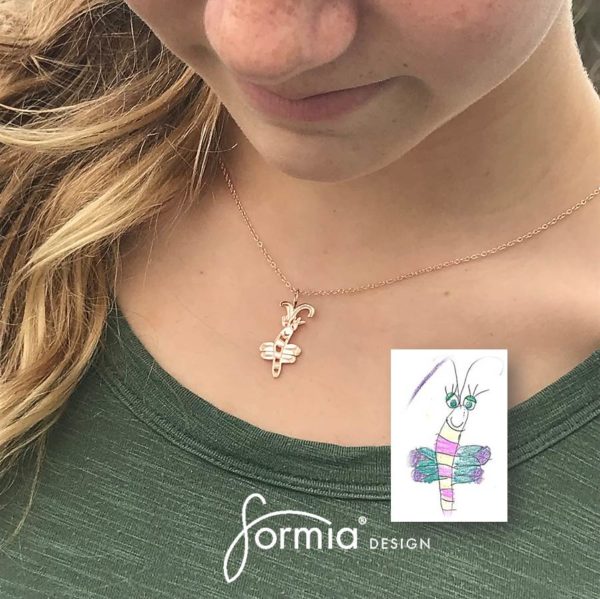 Gold charm from drawing dragonfly in rose gold