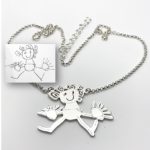Attached pendant necklace with rolo chain girl with curly hair