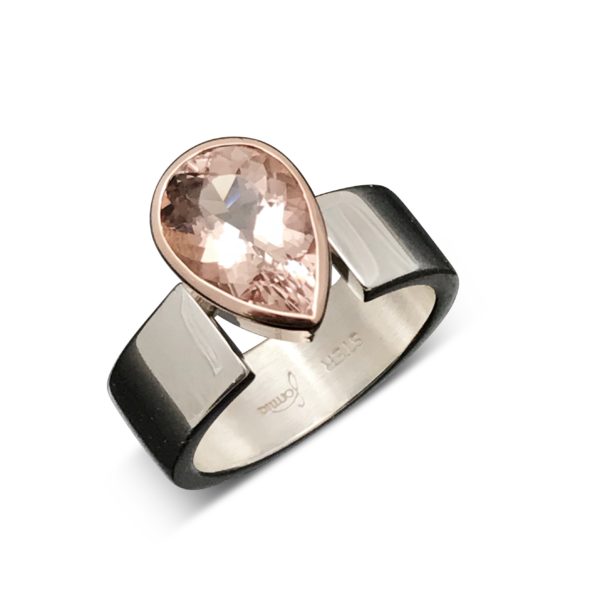 Morganite rose gold drop ring Modern and exceptionally beautiful, sterling silver band holds the setting in solid 14k rose gold with a pear faceted cut Morganite. The colors are fantastic together!