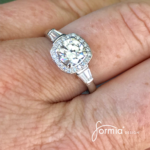 diamond halo engagement ring cushion shape on finger