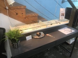 Display set up kids art as jewelry for studio tour 2018