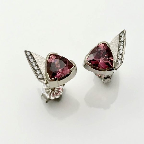 Stud earrings with pink trillion cut torumalines and bead set diamonds