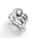 fine jewelry photo gallery 3 band ring small diamond solitaire set in half bezel, silver and platinum