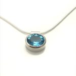 Blue topaz gemstones slider necklace in silver bezel and snake chain