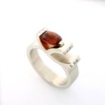 Brave ring with oval madeiran citrine, rocking chair design and accent diamonds