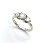 Lotus flower design 3 stone diamond engagement ring
