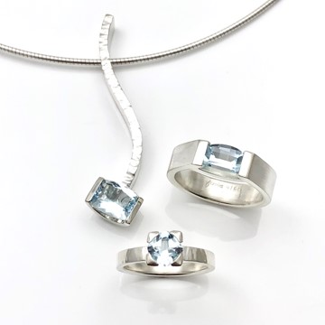 Sky blue topaz and aquamarine gemstone jewelry design by Mia van Beek