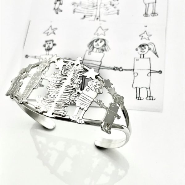 Christmas drawing of family on a bracelet