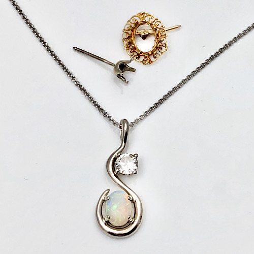 Orphaned earrings redesigned in to a necklace diamond and opal