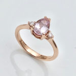 Pink sapphire proposal in rose gold ring