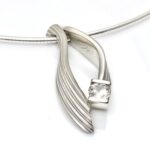 Dads old wedding band has new life as a necklace, combination pendants for multi use wear