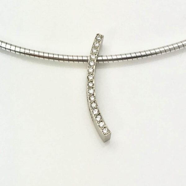 Diamond pendant in curved shape for simply adding sparkle to your neck