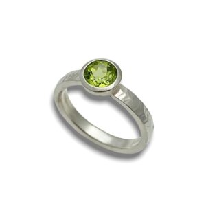 Green peridot stack ring with angled hammering on ring band