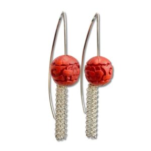 Red bead tassel earring with man made bead carved resin material