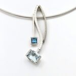 Tones of blue and diamonds in lovely combination of pendants
