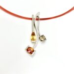 Topaz and quartz gemstones in fall leaf colors, in a modern interchangeable design