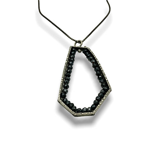 Geode Hexagon black spinel pendant stylish and unique design by Erica Stankwytch Bailey sold @ Formia Design Sterling silver pendant with black spinel stones