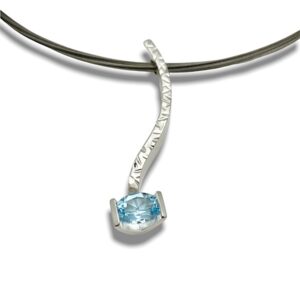 Sky blue topaz serpentine pendant in sterling silver