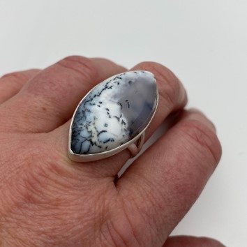 White mossagate ring marquise shape on the hand